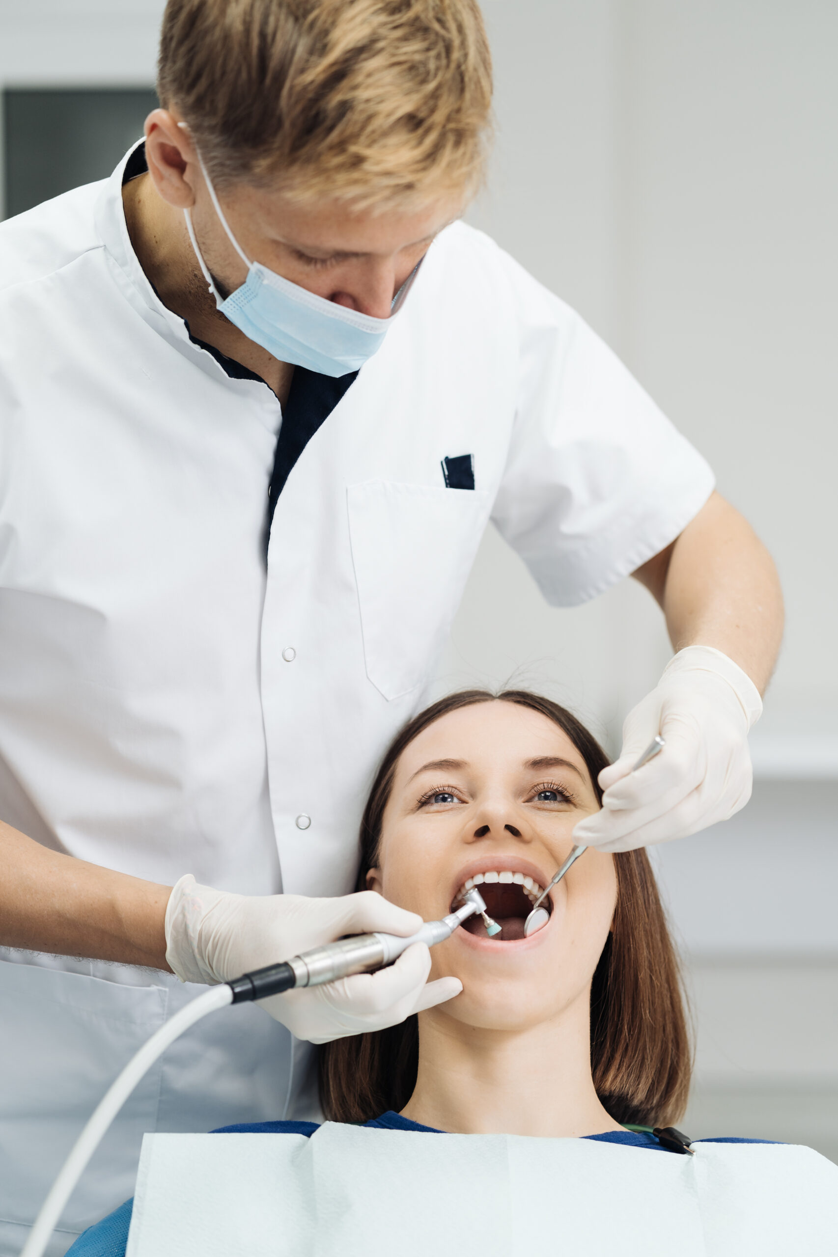 Oral hygiene, dentist doing Scaling and brushing procedure